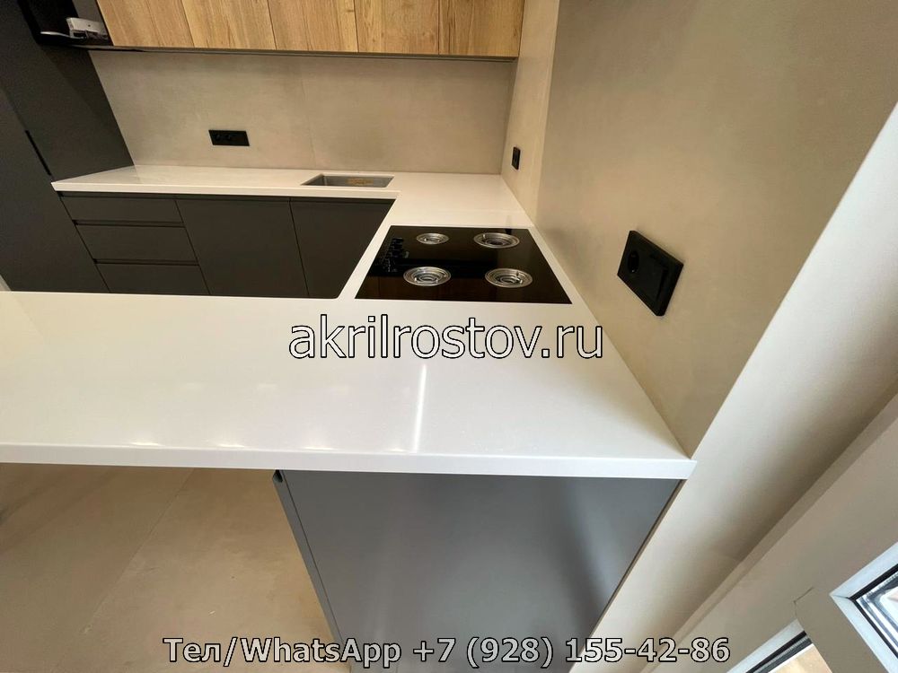 Производство угловых столешниц из акрилового камня под заказ Эксклюзивная акриловая столешница белого цвета для угловой кухни