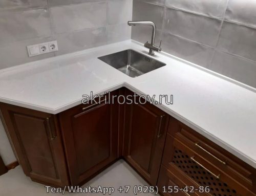 Угловая столешница белого цвета из акрилового камня на заказ с мойкой